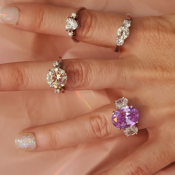 4 beautiful rings silver tone - Picture 2 of 11